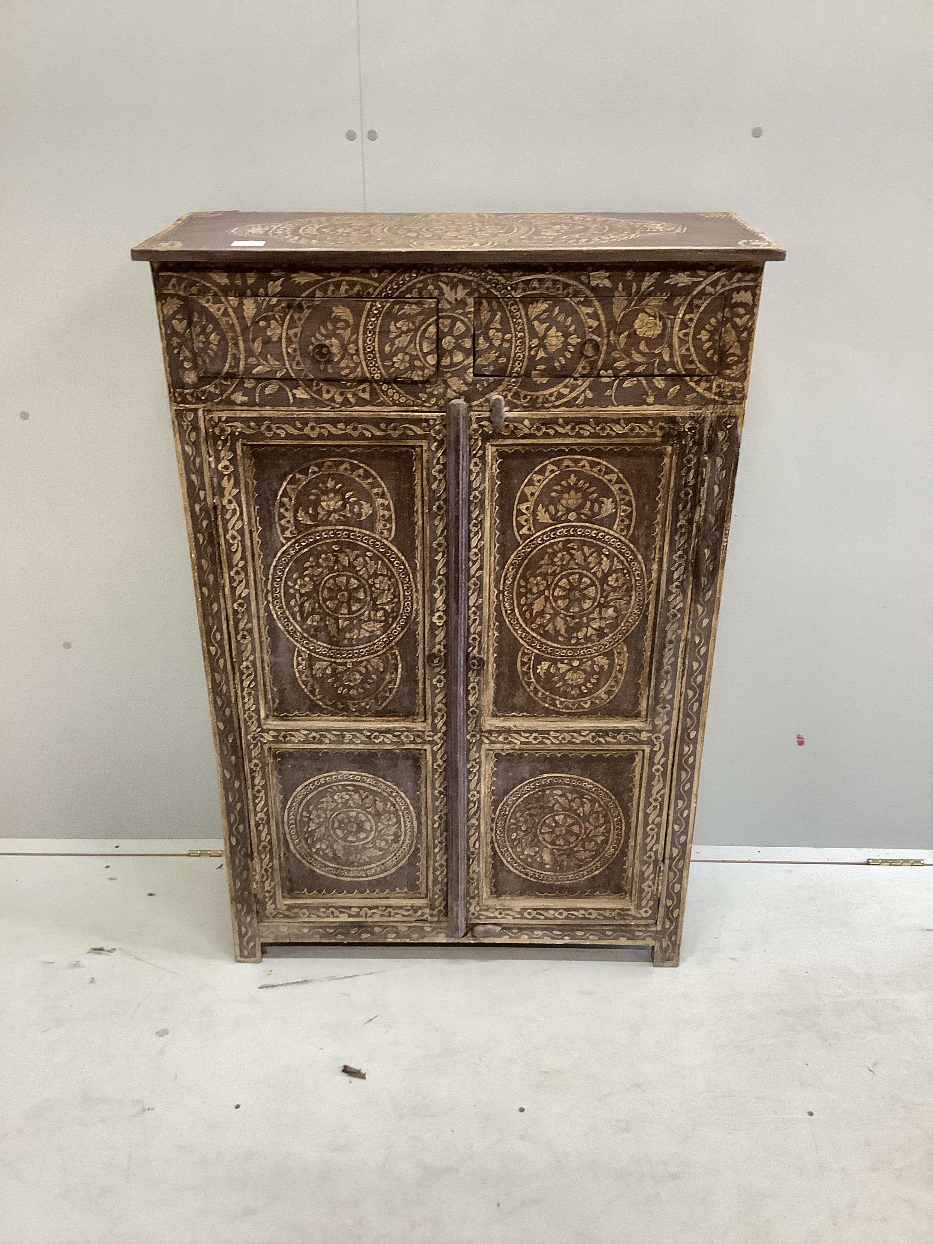 An Indian painted two door side cabinet, width 81cm, depth 32cm, height 122cm. Condition - fair